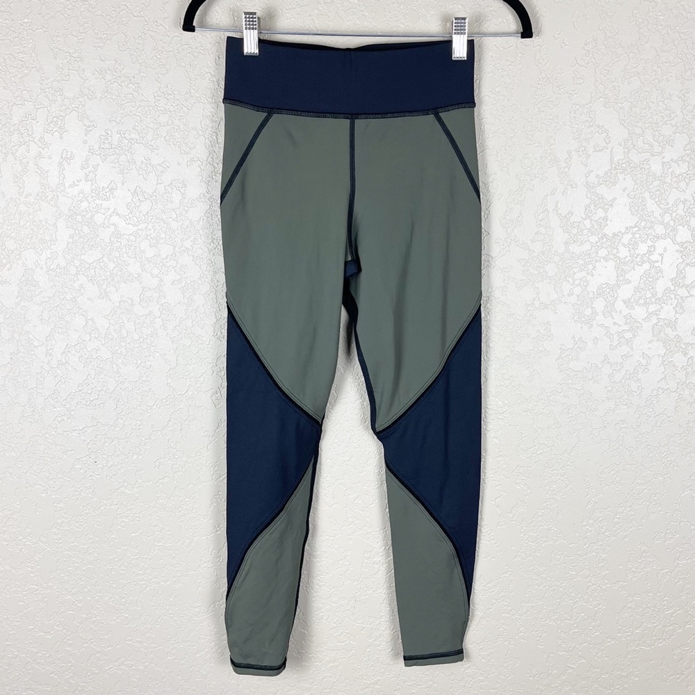 Michi green and black color block leggings